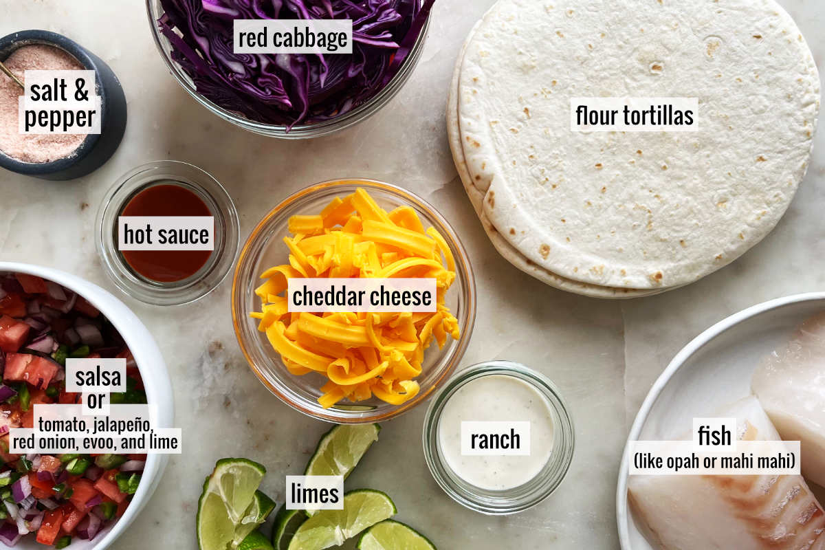 Tortillas on a coutertop with other ingredients and salsa.