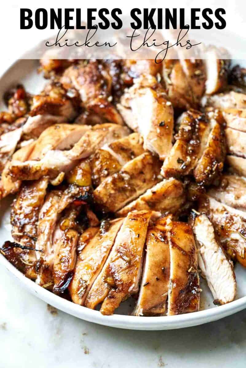 Sliced chicken on a white plate with title text.