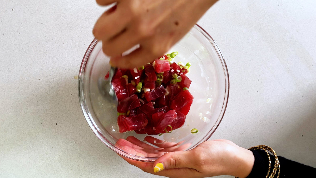 Tuna tartare in a glass bowl.