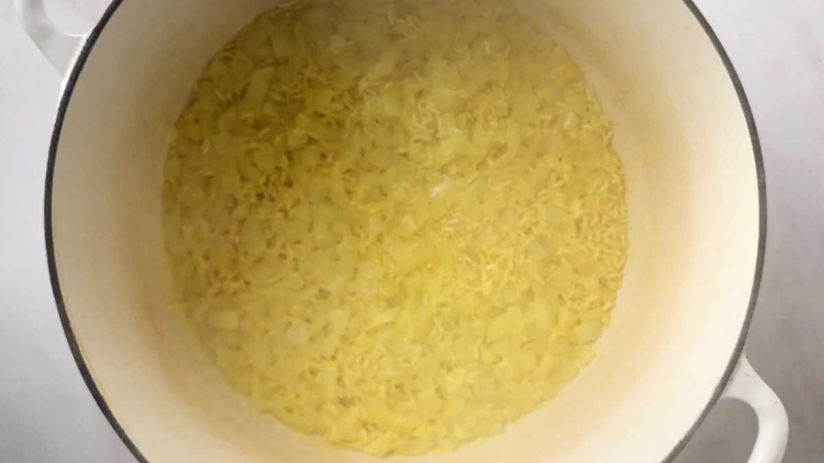 Steaming yellow rice.