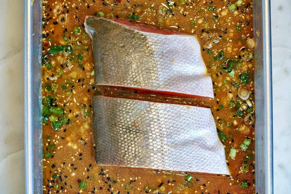 Salmon filets on a baking sheet.