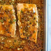 Cooked salmon on a baking sheet.