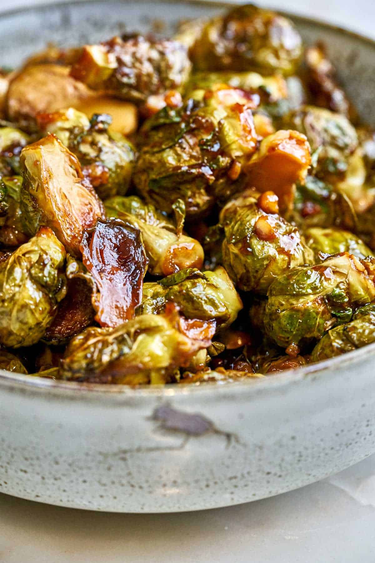 Saucy brussel sprouts in a bowl.