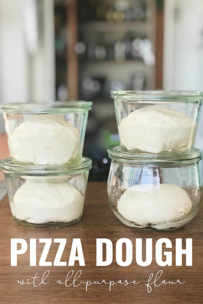 Four glass jars on a wood table with dough in them with title text.