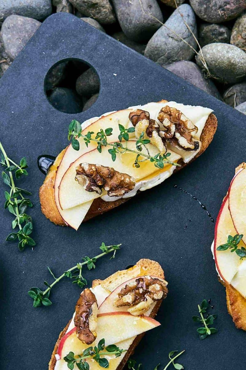 Crostini on a cutting board.