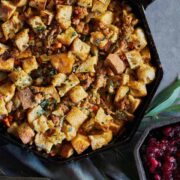 Cast iron pan with bread and sausage stuffing.