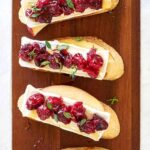 Crostini on a cutting board.