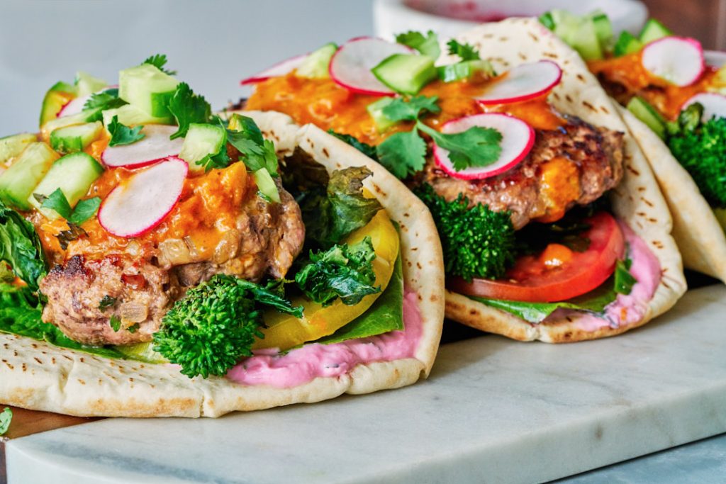 Madras Curry Lamb Burger Gyro with Broccoli Rabe and Cactus Pear Yogurt | Proportional Plate