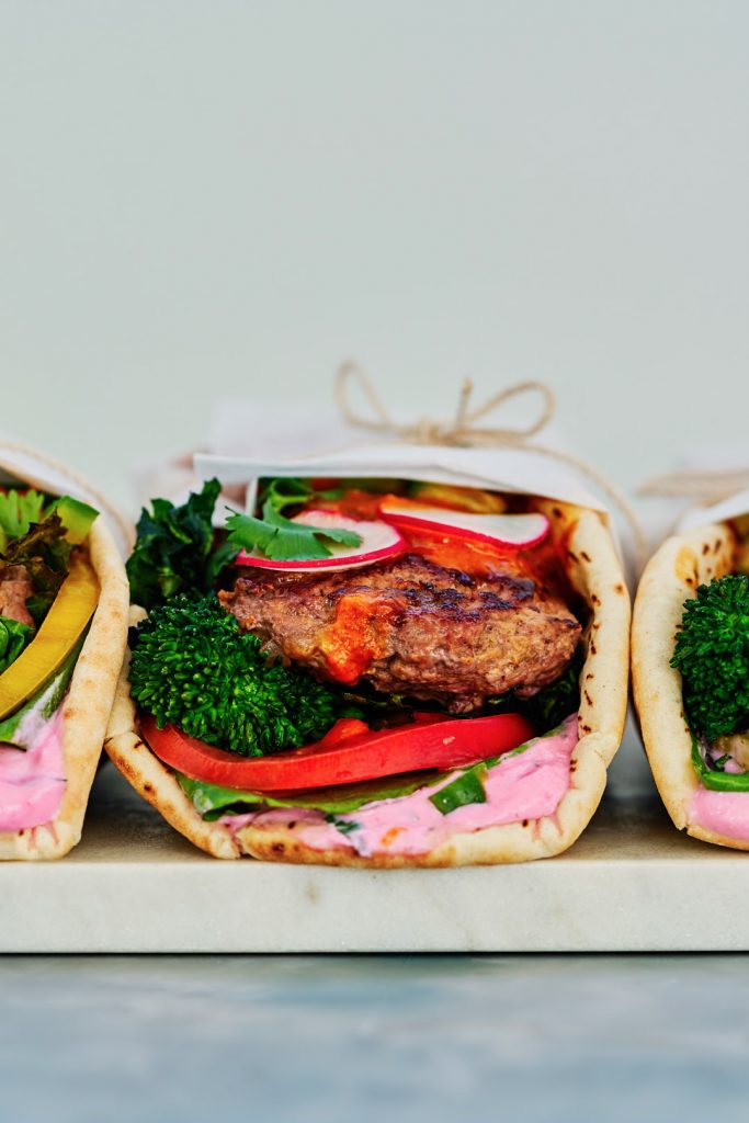 Madras Curry Lamb Burger Gyro with Broccoli Rabe and Cactus Pear Yogurt | Proportional Plate