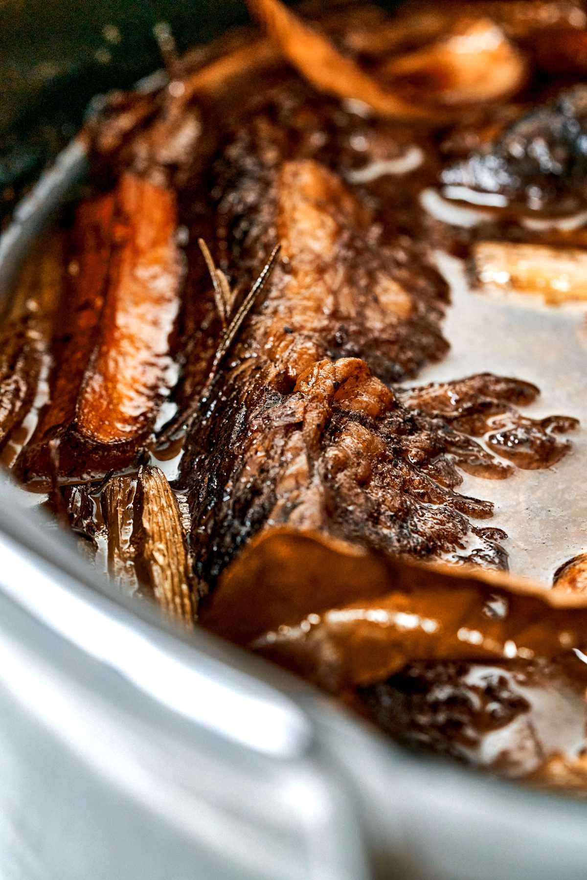 Close up of meat in a slow cooker.