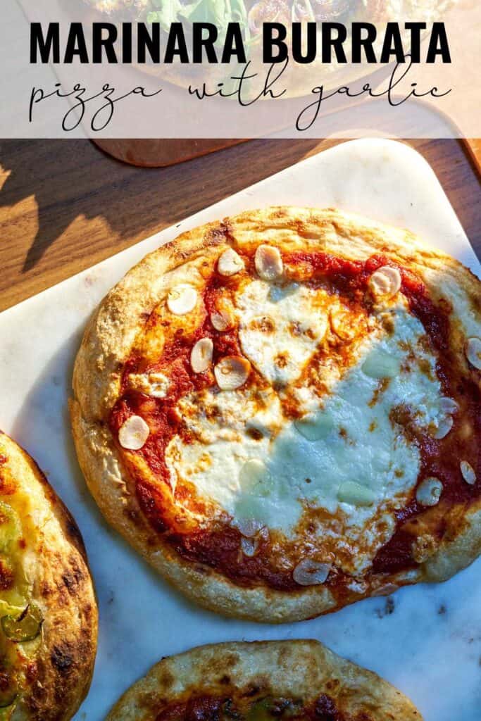 Pizza on a white marble cutting board next to three other pizzas with title text.