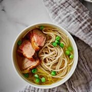 Bowl of noodle soup with duck.