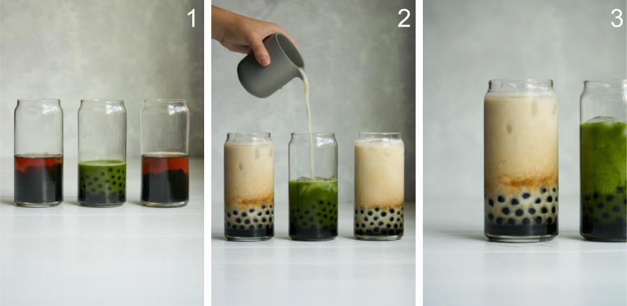 Pouring milk into a matcha latte next to tea lattes.