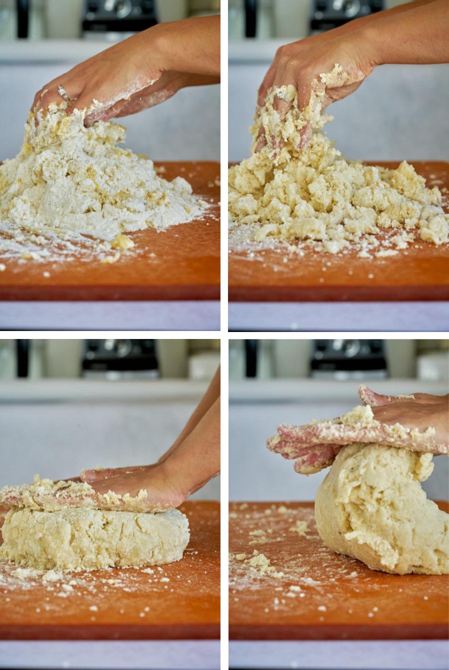 Hands mixing together dough.