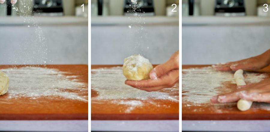 Rolling dough on a brown cutting board.