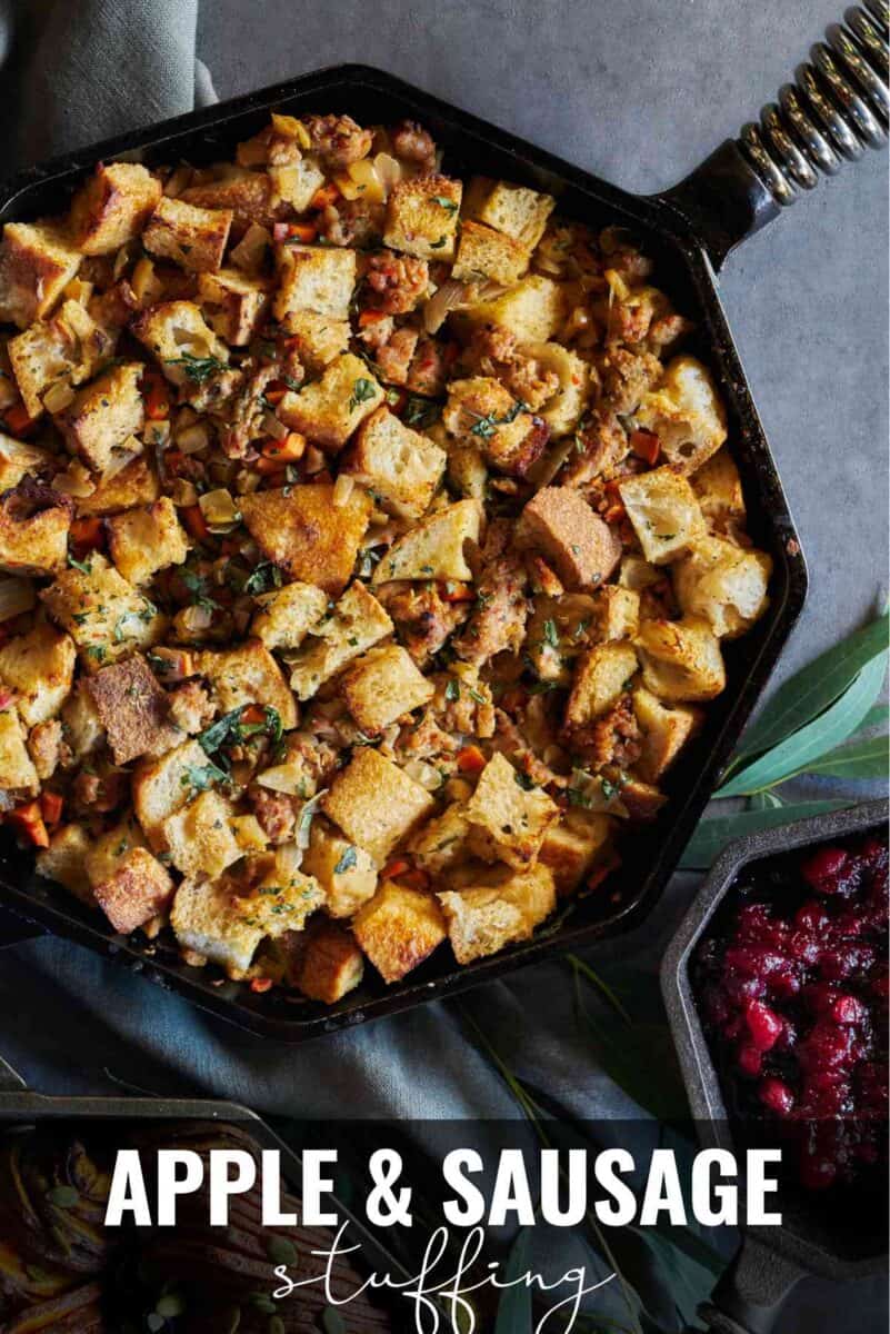 Cast iron pan with bread and sausage stuffing with title text.