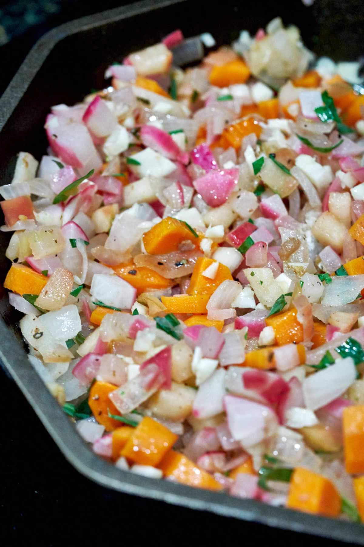 Pan with sauteed vegetables.