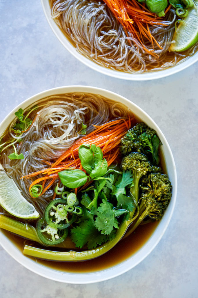 Bowl of soup with noodles and vegetables.