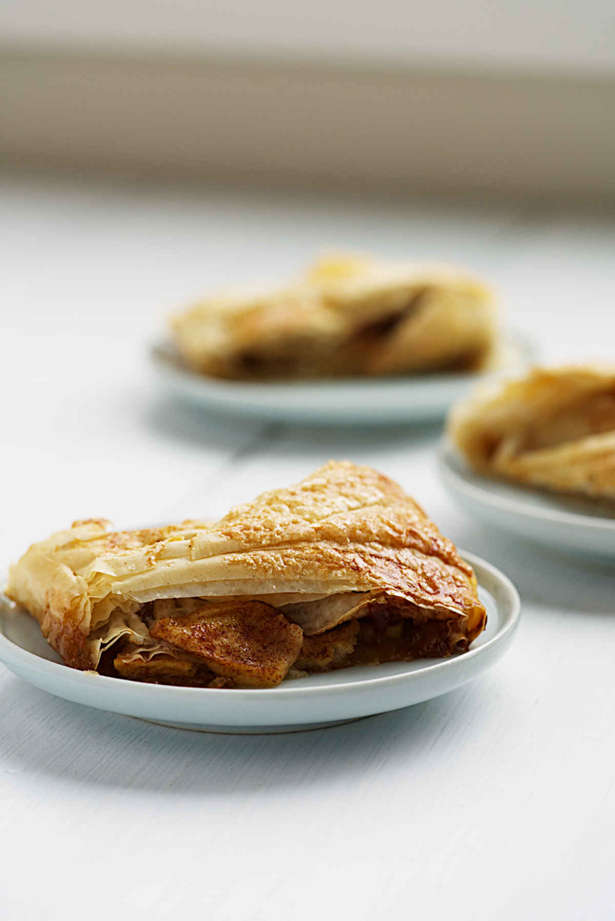 Apple pastry on a small plate.