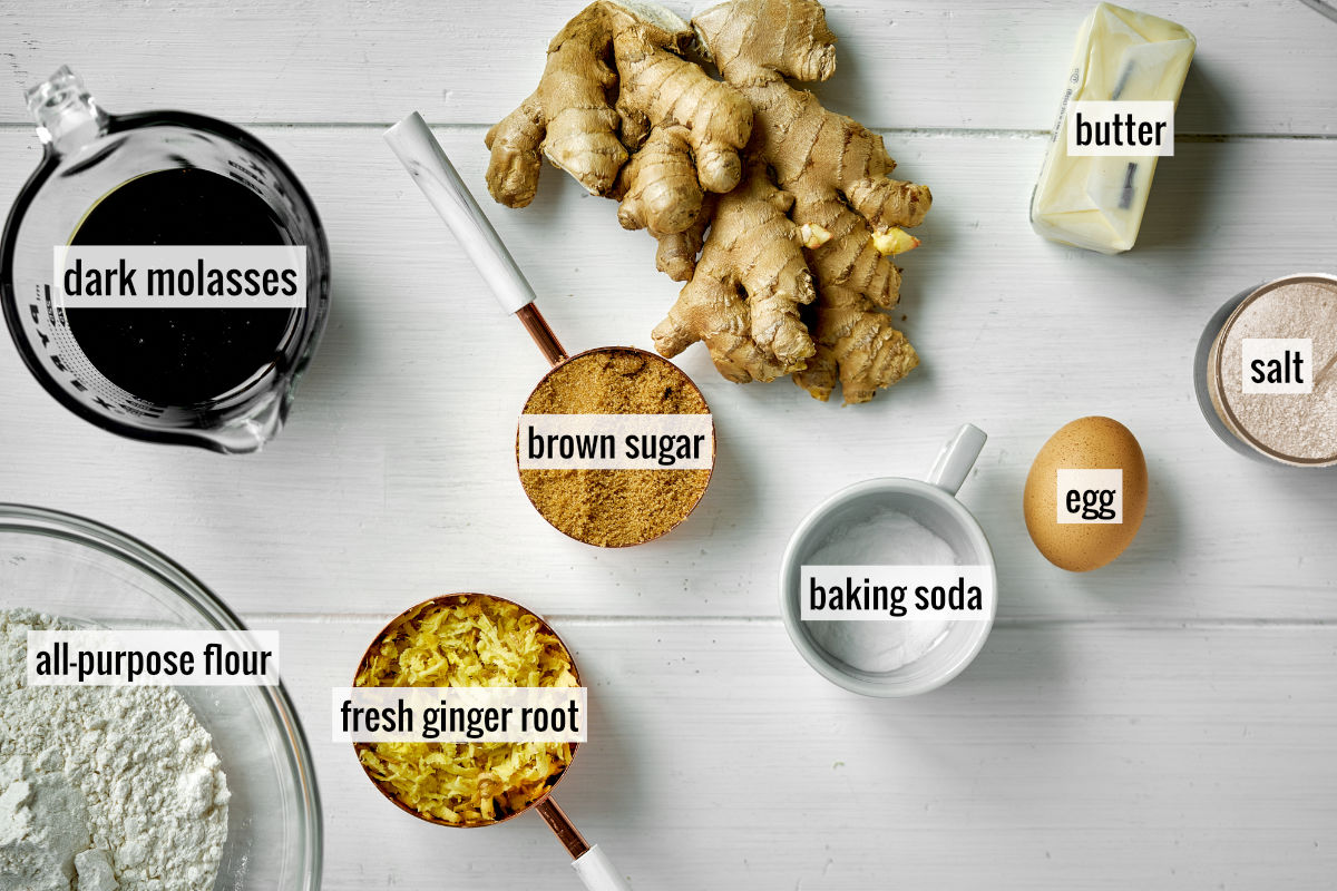 Ginger and other ingredients to make cake on a countertop.
