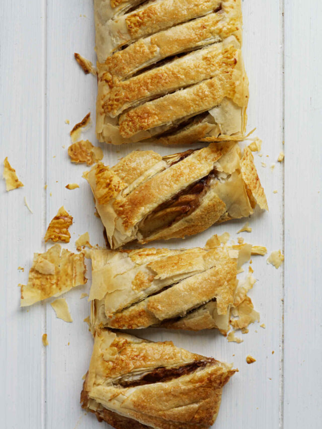 Apple strudel made with phyllo dough so it's flaky and cut into individual portions.