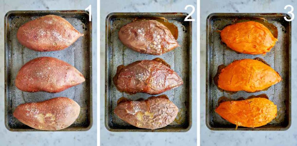 Three sweet potatoes on a baking sheet.