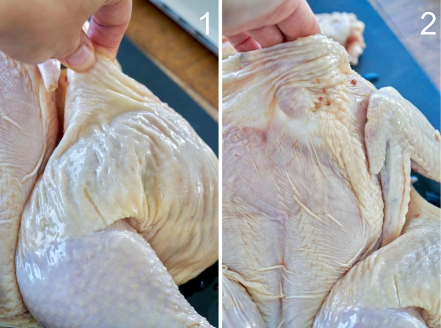 Hand showing where to put marinade under skin of chicken.