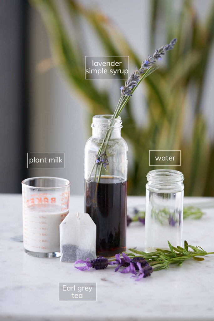 Ingredients for earl grey tea latte including lavender simple syrup.