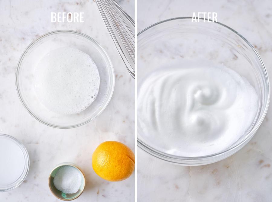 Whipped egg white in a clear bowl on a white countertop.