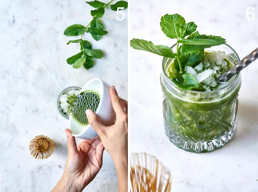 Pouring matcha into a cocktail next to a glass of green tea cocktail garnished with mint and a stirrer.