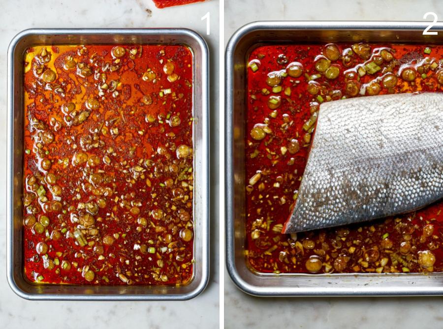 Salmon flesh side down in a sheet pan with teriyaki style sauce.