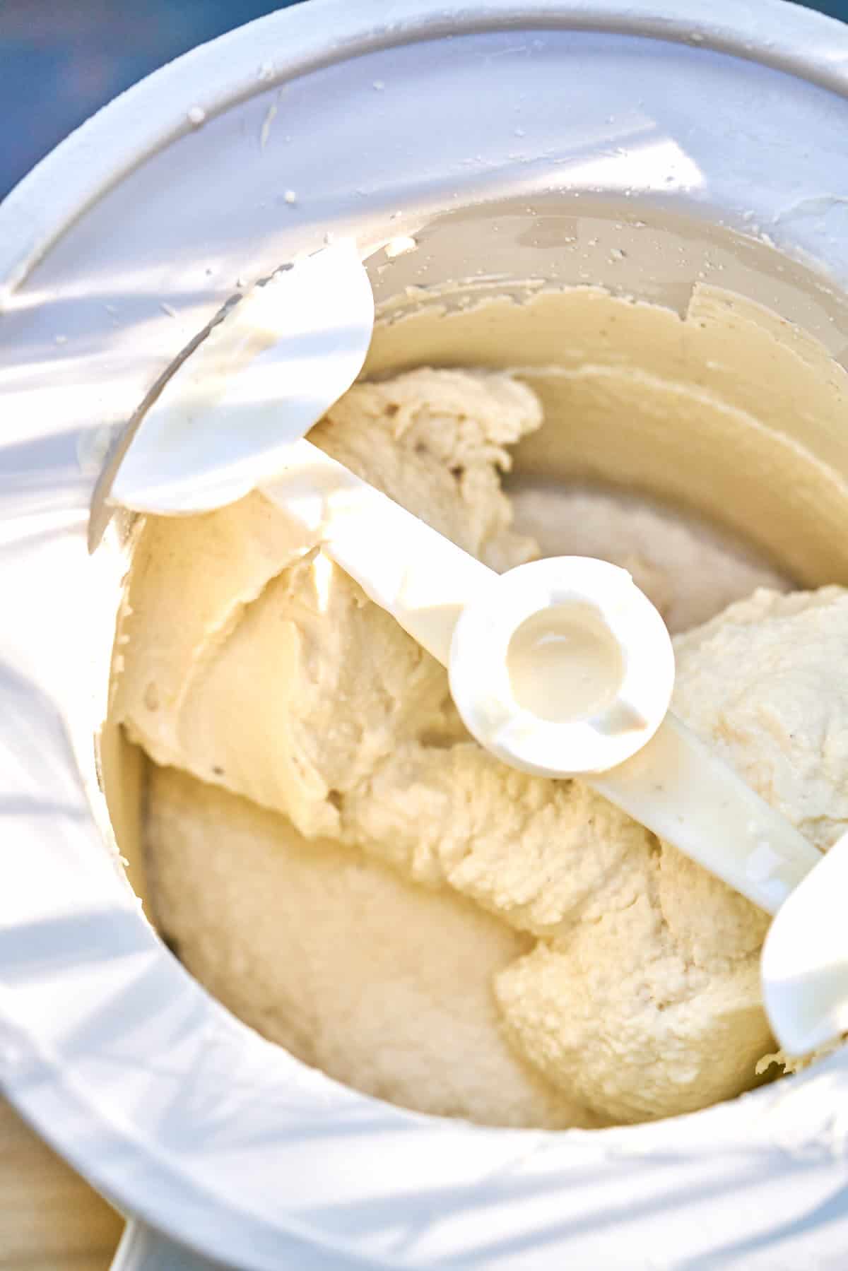 Ice cream churning in an ice cream maker.