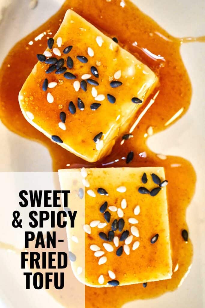 Two cubes of tofu covered in sauce and sesame seeds with title text.