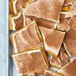 Top view of a sheet pan full of toffee.