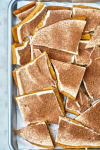 Top view of a sheet pan full of toffee.