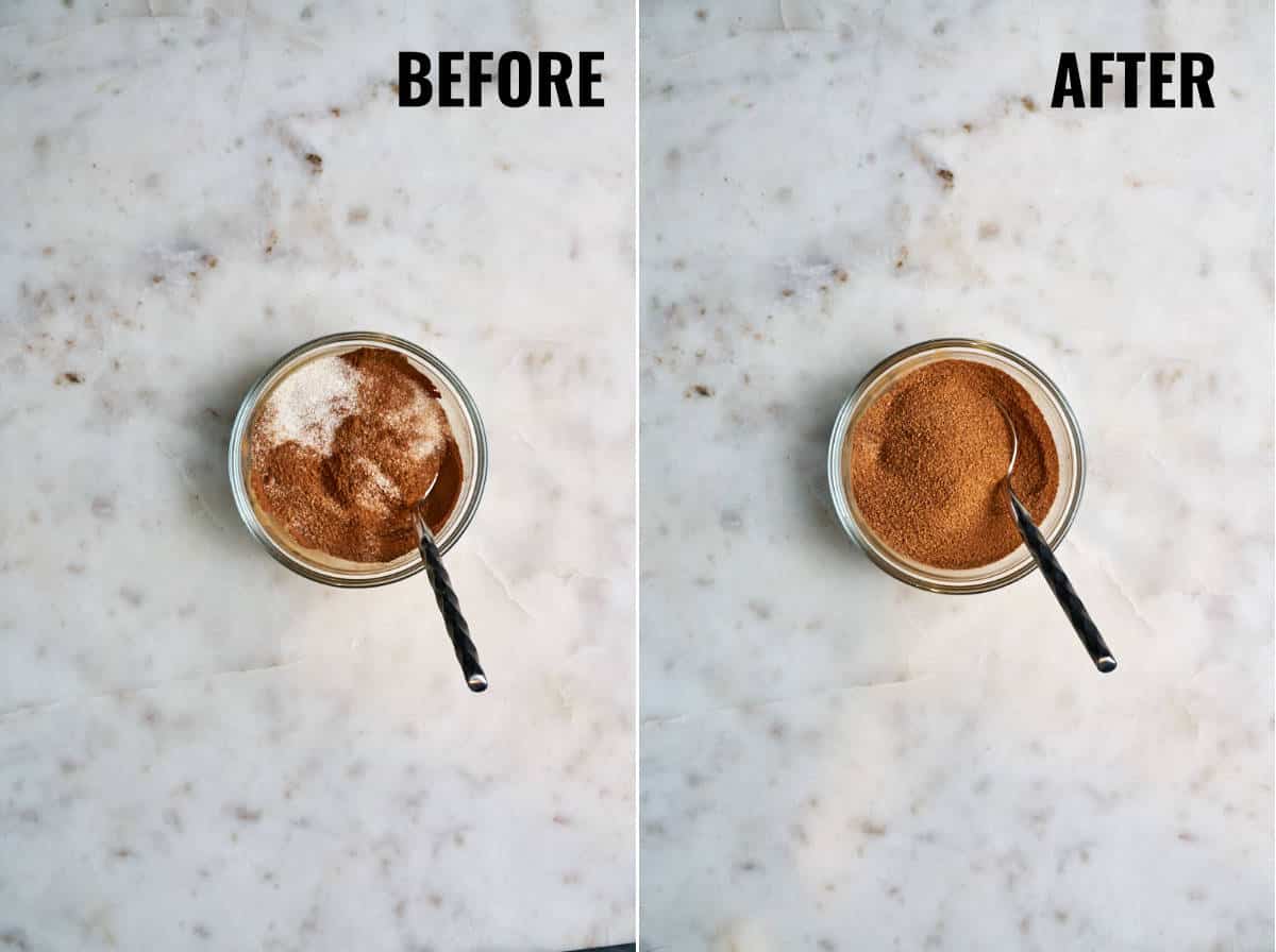 Cinnamon and sugar mixed in a clear bowl with a metal spoon.