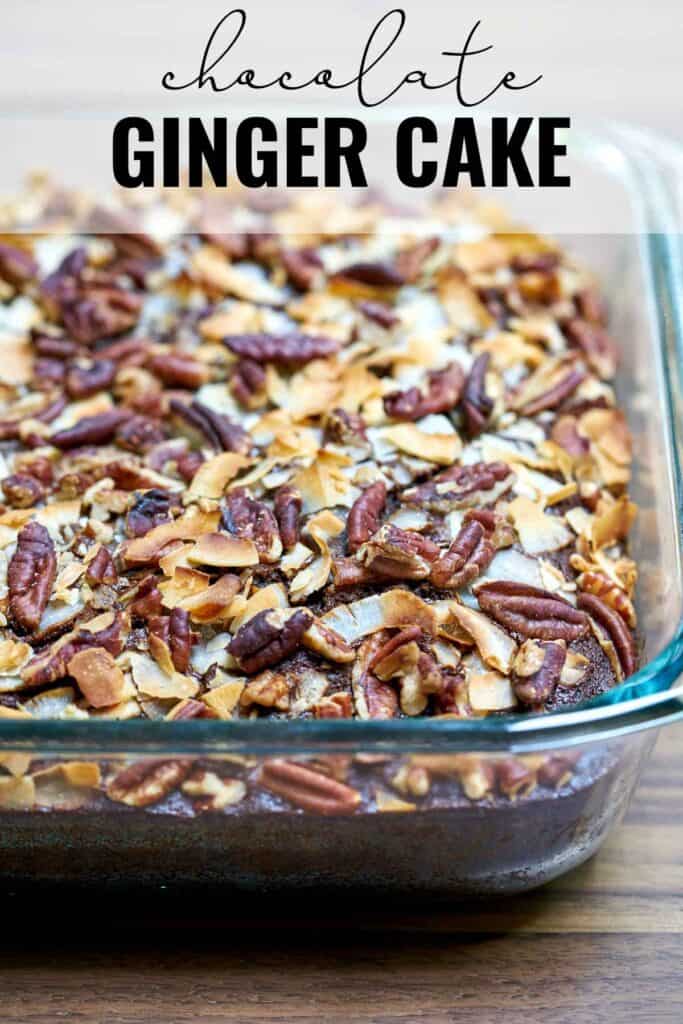 Cake in a glass baking dish covered in pecans and coconut after baking with title text.