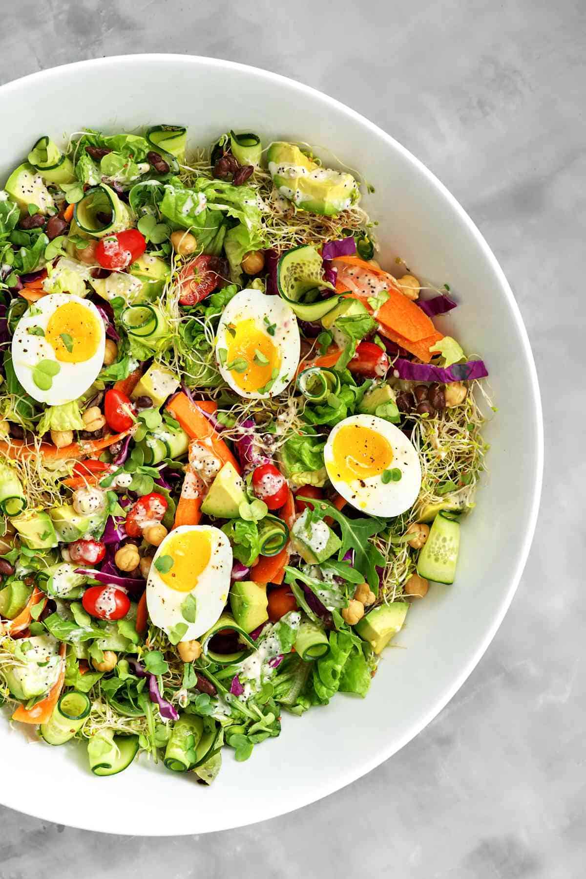 Salad with jammy eggs and cucumber.