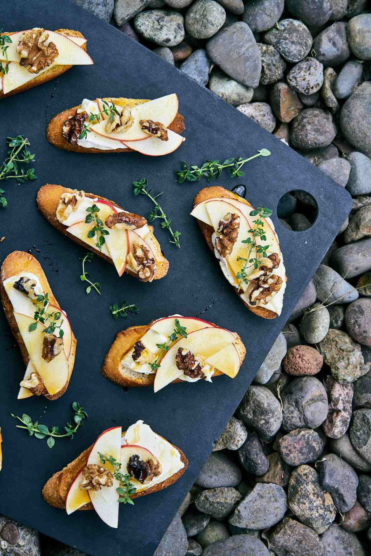 Crostini on a cutting board.