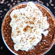 Top of chocolate pudding with whipped cream.