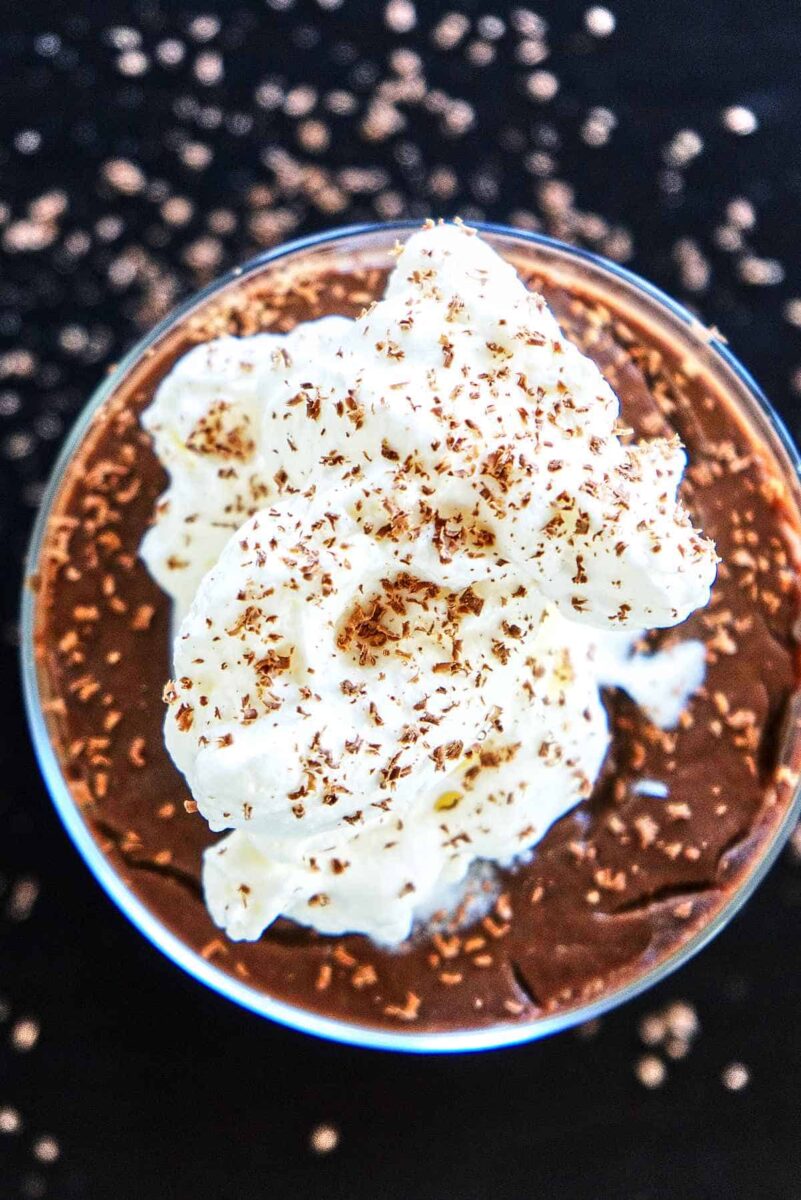 Top of chocolate pudding with whipped cream.