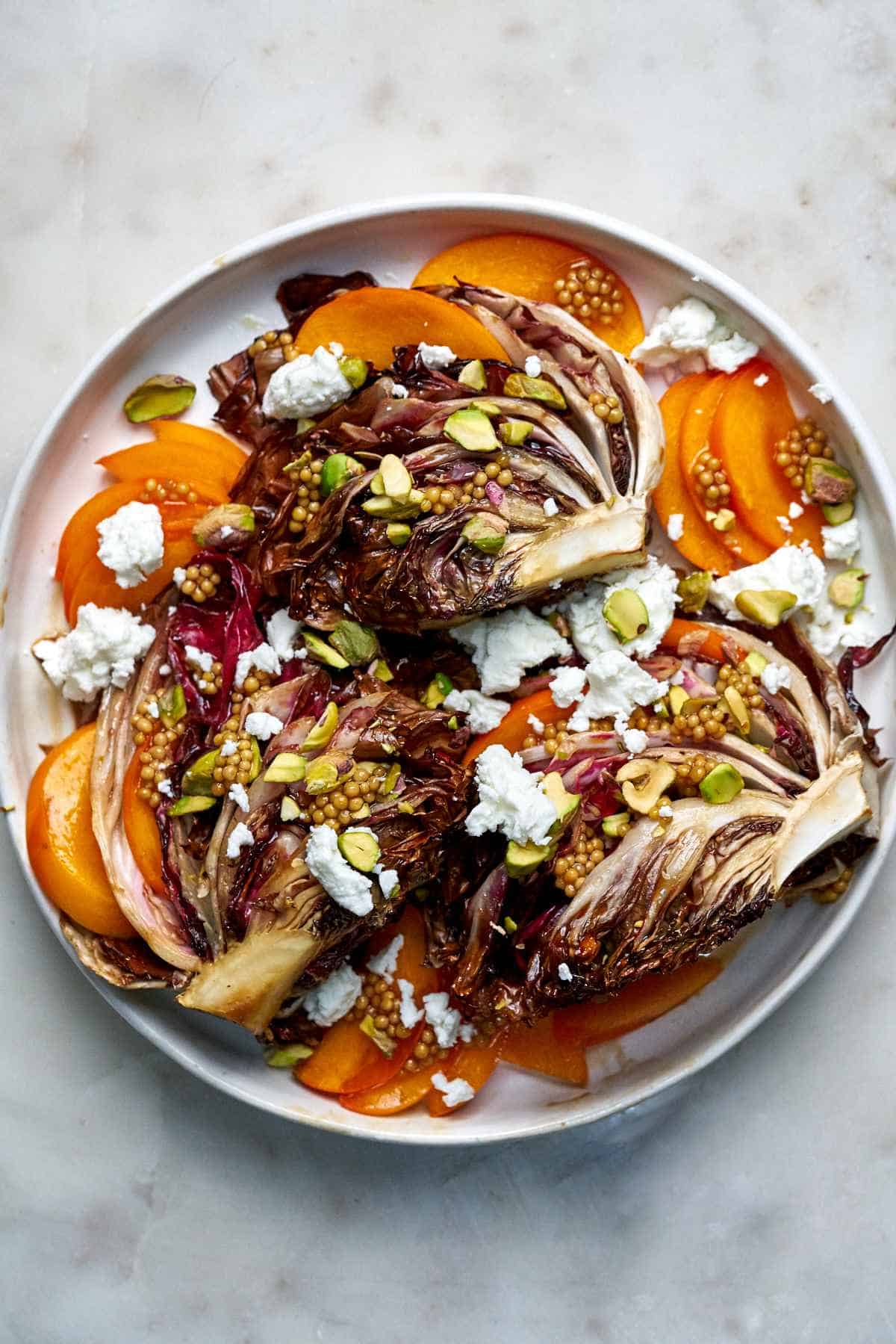 Roasted radicchio with persimmon and goat cheese.