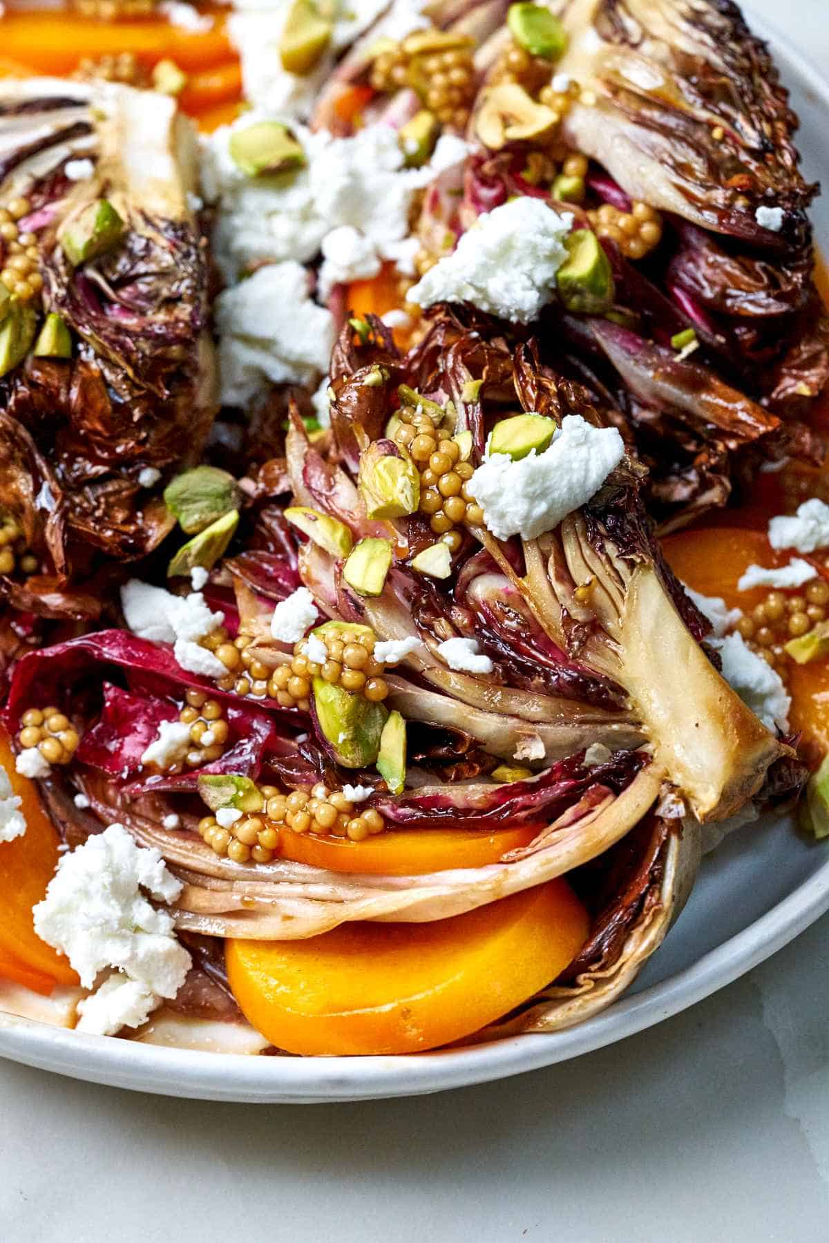 Close up of roasted radicchio and persimmon.