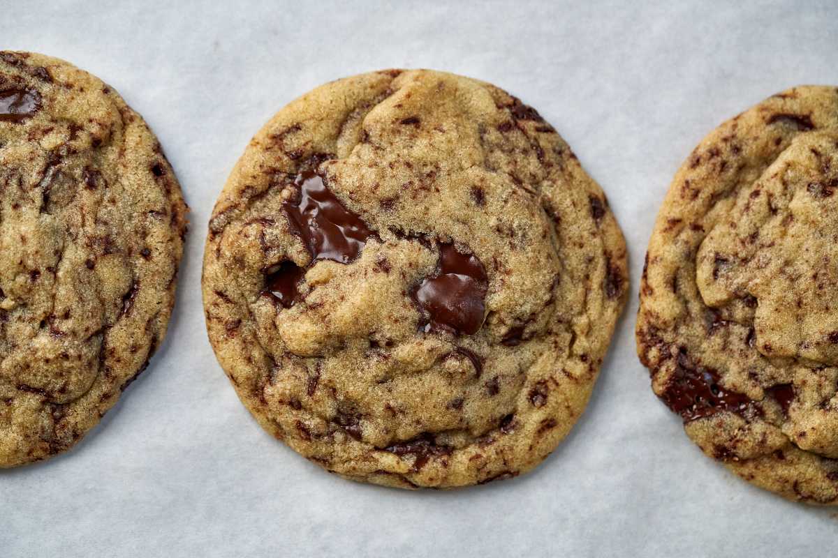 Three cookies on parchment.