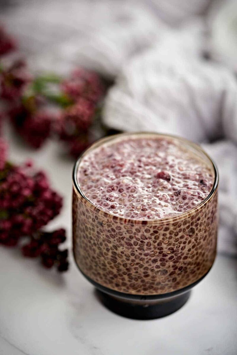 Cup of purple chia pudding.