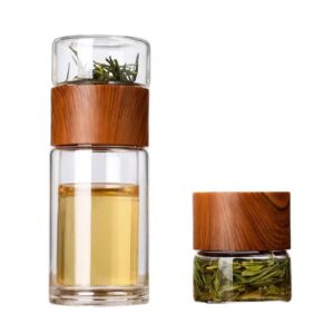 Glass and wood tea steeper bottle.