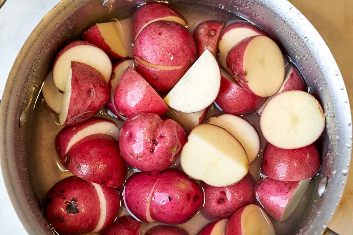 Red potatoes in a pot.