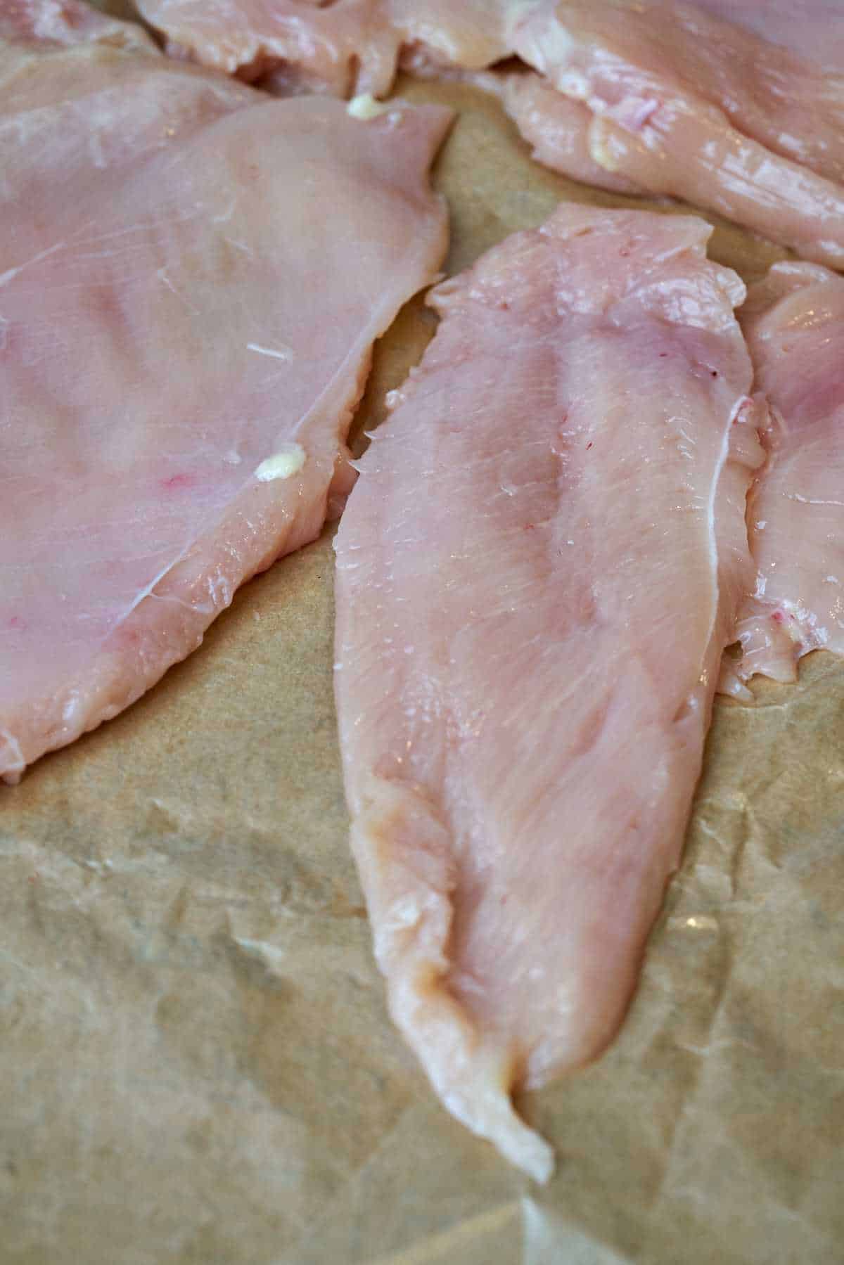 Thinly pounded chicken breast.