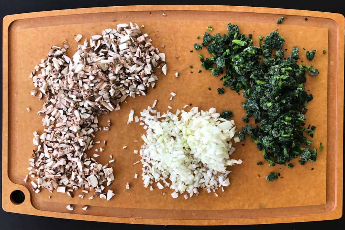 Chopped ingredients on a cutting board.