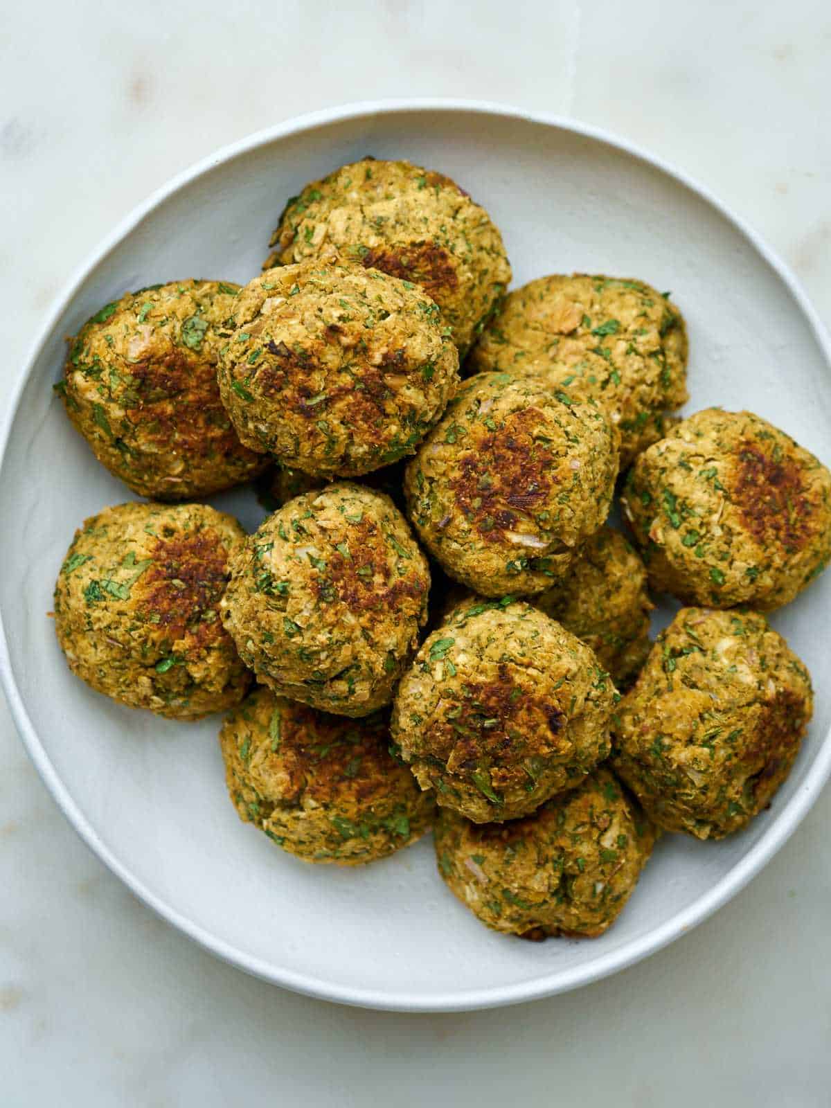 Plate filled with falafel.